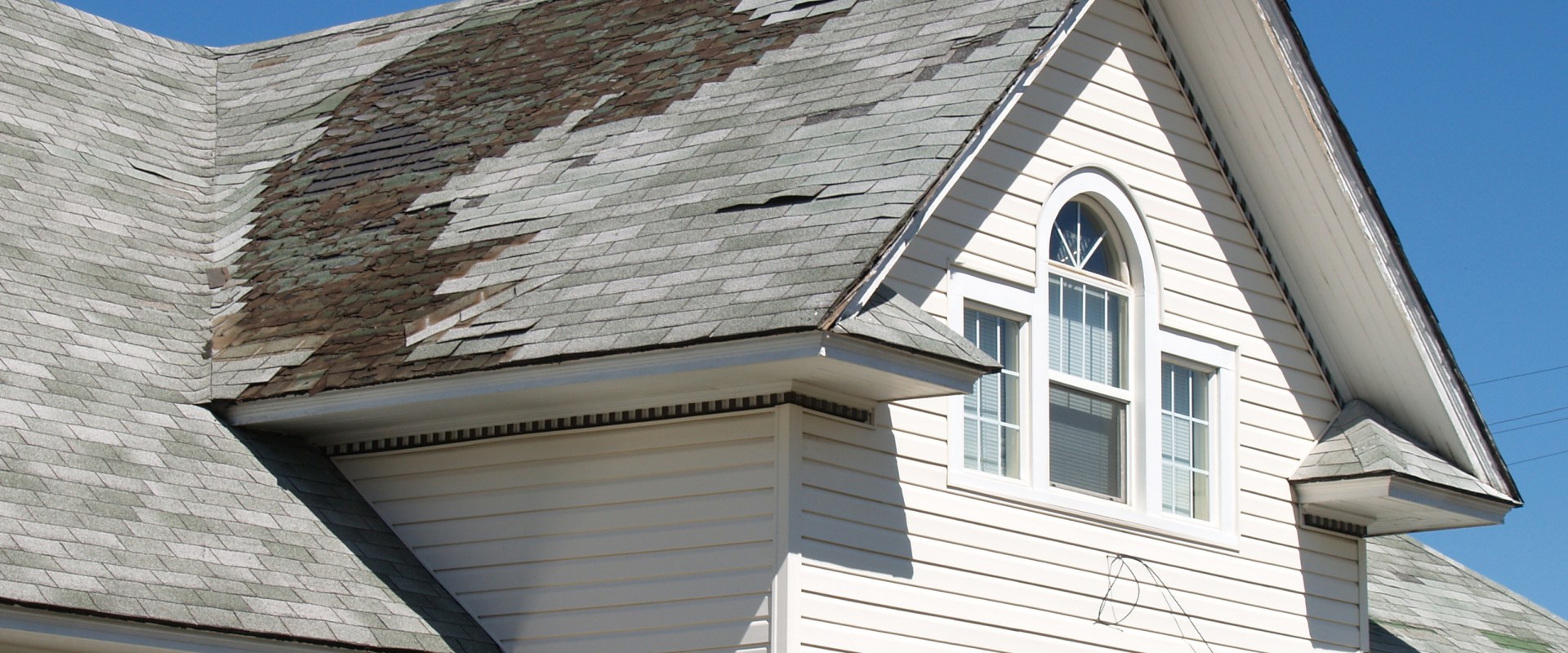 Is it better to patch a roof or replace it?